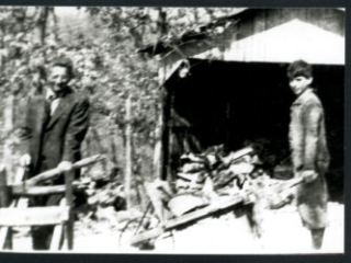 #5 Silex, Mo. Mr. Loewnhaupt and Walter, woodchopping preparing to chop wood