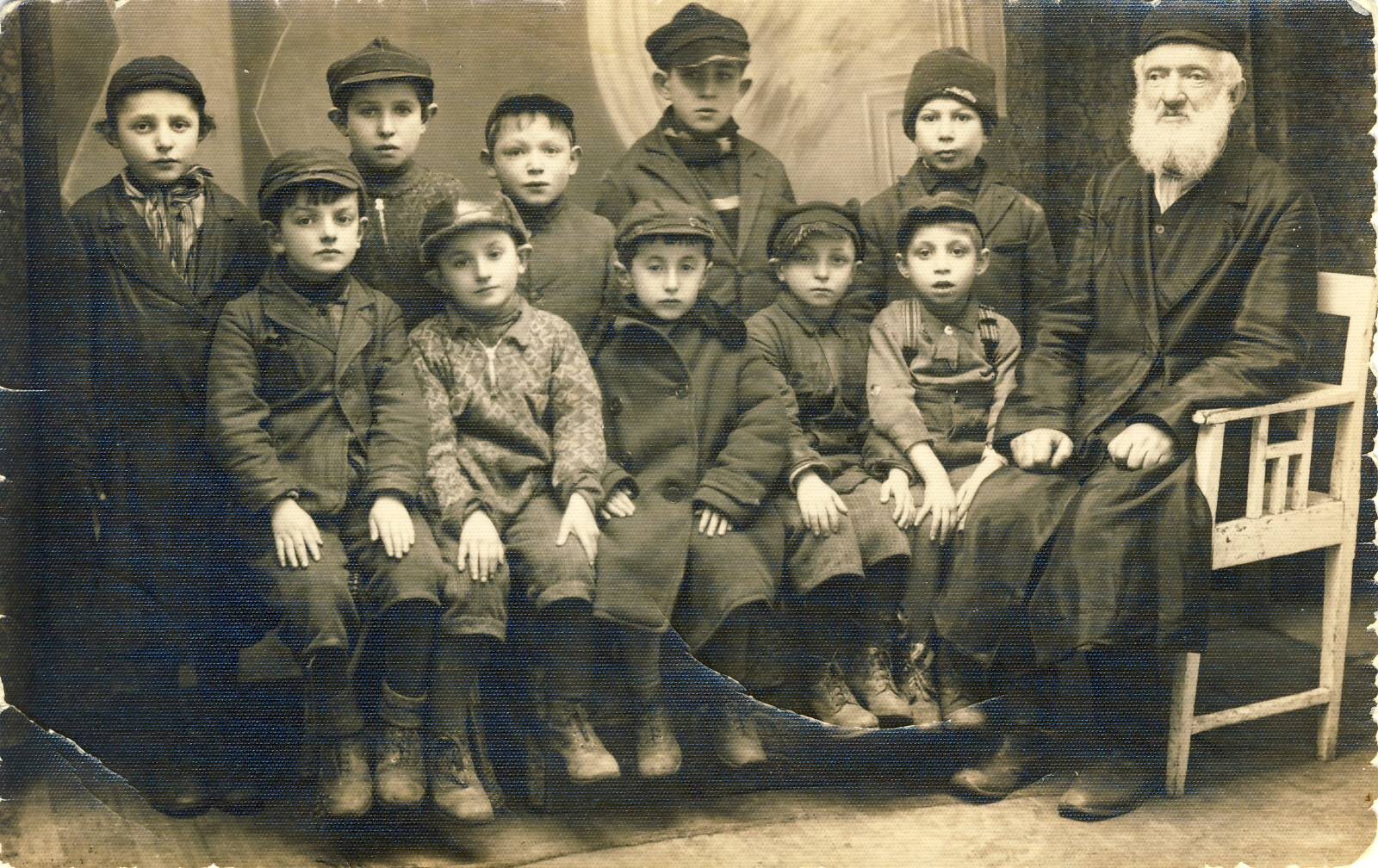 Poor children with Alex Perez's father in Ozorkow, Poland 1936