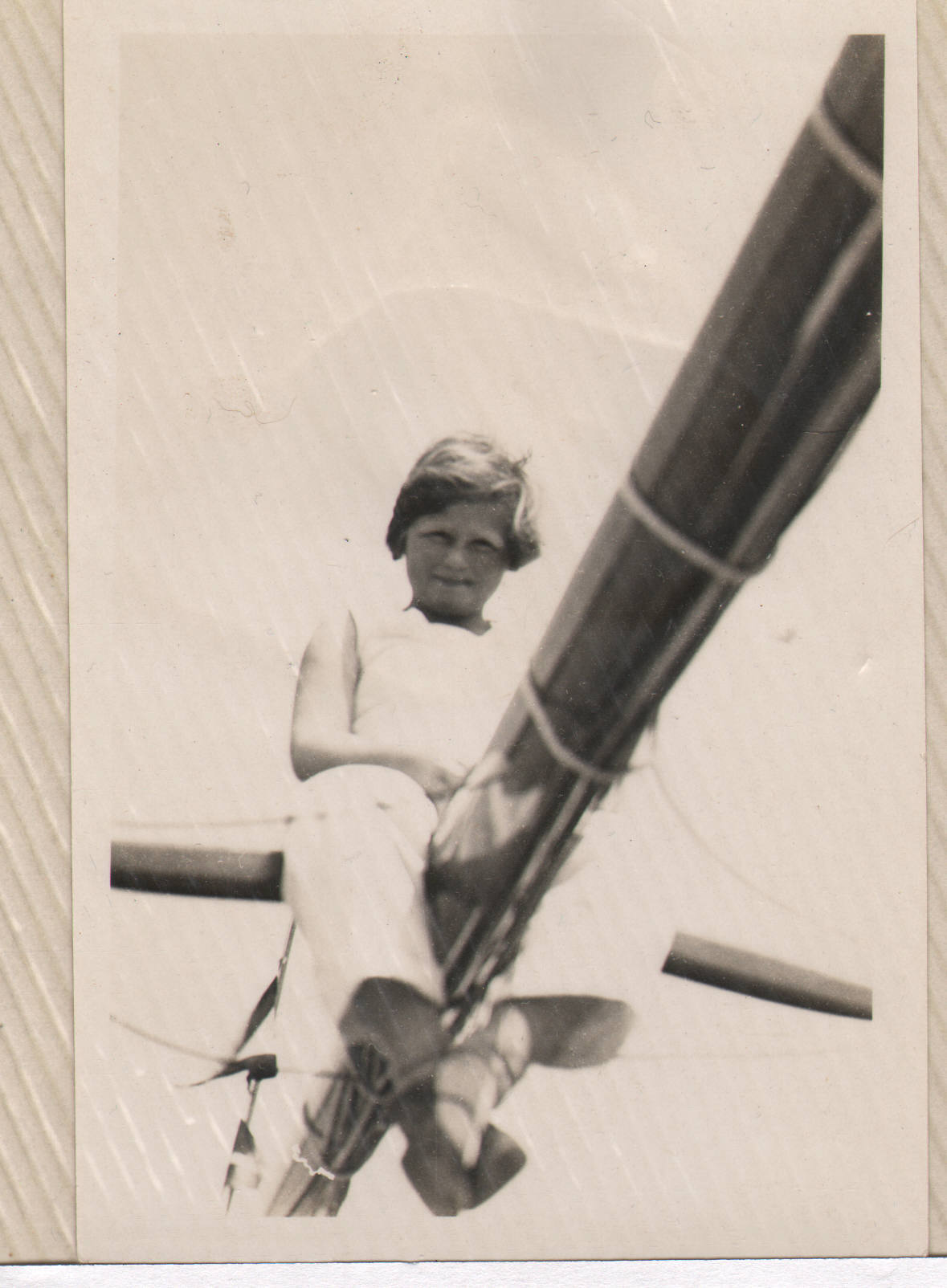 Ruth on mast of father's racing yacht