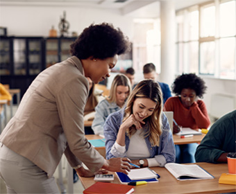 image of teacher teaching students